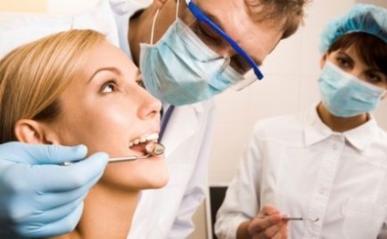 Як кріпляться зубні коронки, клініка санація