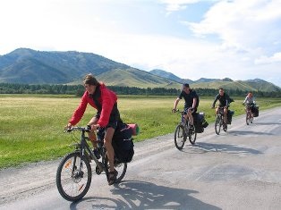 Care este distanța medie pe zi pentru un tourer de biciclete