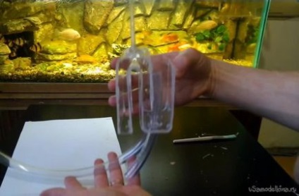Sistem pentru scurgerea apei din acvariu cu mâinile tale