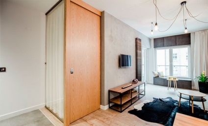 Loft stílusú belső kis lakásban