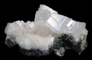 Caracteristicile albite ale acestui mineral, compoziția sa chimică, proprietățile de vindecare și mistică
