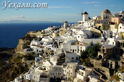 Cele mai bune fotografii ale insulelor Santorini și hoteluri, apusuri de soare și pisici