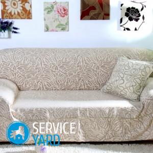 Varrni egy köpenyt a kanapén kezében, serviceyard-kényelmes otthon kéznél