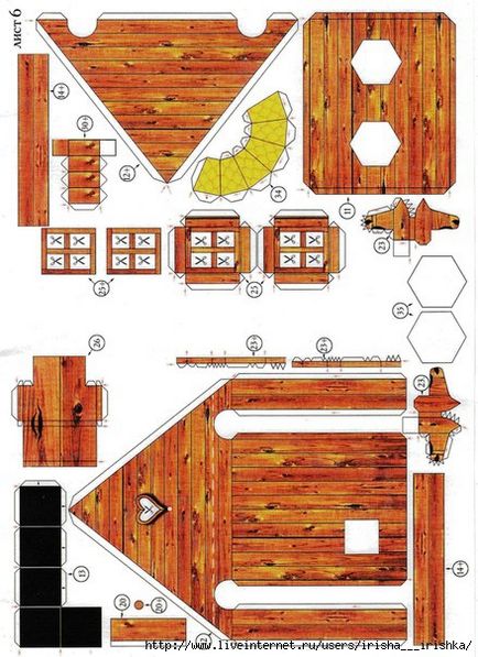 Un model al cabanei realizat din hârtie cu mâinile proprii