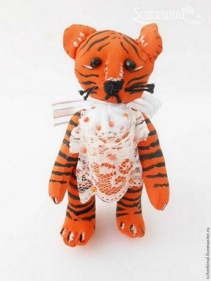 Іграшка на ялинку тигр