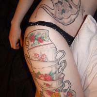 Красиві татуювання для дівчат на стегні