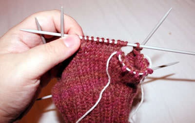 Cum de a tricota o mitten pană degetul mare