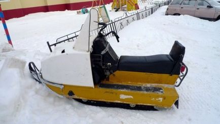 Cum să tragi o mașină pe un snowmobile de snowmobile