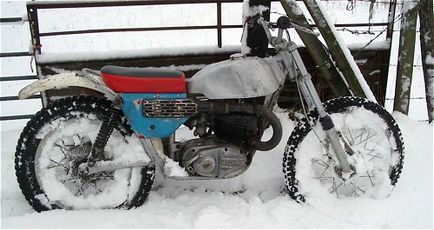 Cum să reglați lanțul reductorului de snowmobile