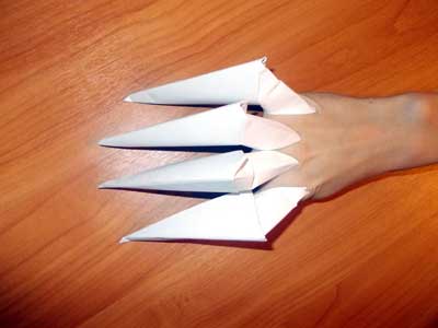 Як зробити кігті з паперу шредера