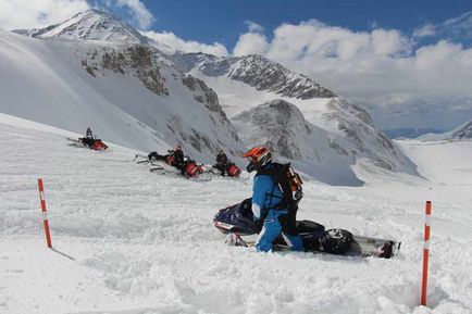 Scoala de ski de munte pe snowmobile