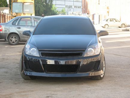 Тюнінг опель айстри, фото тюнінгу салону opel astra j, тюнінг оптики opel astra gtc