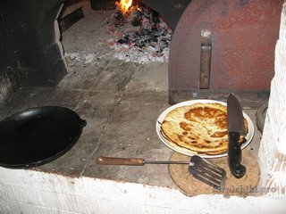 Főzés palacsinta az orosz kályha