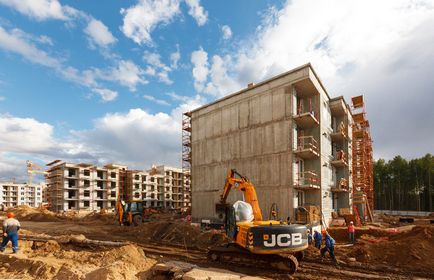 A projektek, a macska és a kis épület, egy park a közelben - a lakáspiac - újság