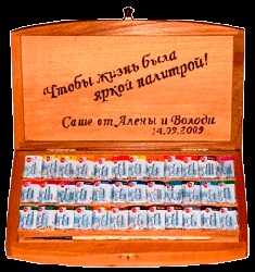 Випалювання по дереву логотипів і написів на російських сувенірах і подарунках