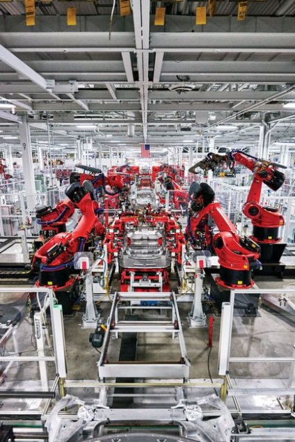 Завод tesla зсередини як роботи штампують електромобілі, futurist - майбутнє вже тут