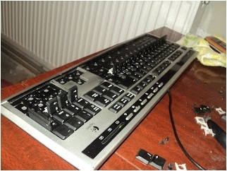 Curățați tastatura de la praful logitech ultra x tastatură ybl49a