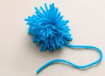 Covor de pom-poms