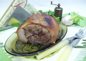 Рецепт з фото запечена свиняча рулька з часником