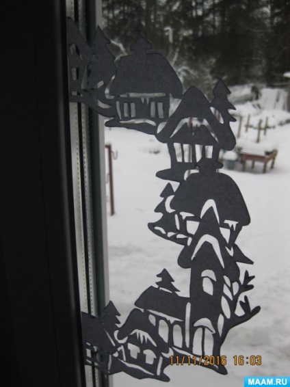 Прикраса «зимових» віконець силуетній вирізкою з паперу