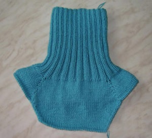 Tricotat ace de tricotat pentru copil în schemele cu o descriere detaliată