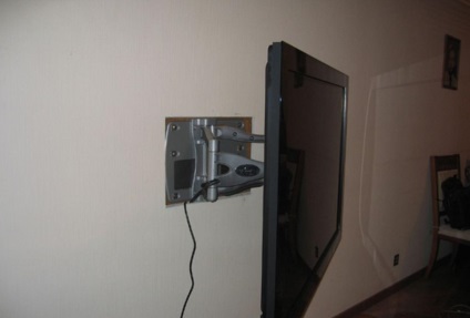 Cum să închideți un televizor pe un perete pentru agățat o plăcuță de ghips, cum să fixați suportul, un zid de cărămidă și