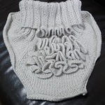 Tricotat pălărie cu clape, am tricot cu lana wi