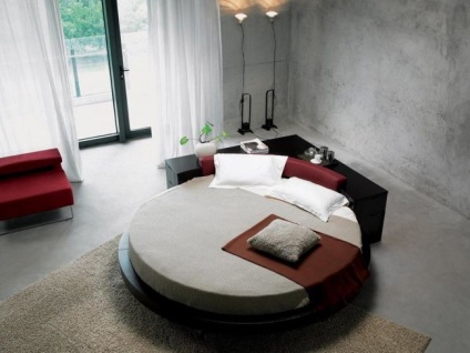 Patul rotund în dormitor (foto) este neobișnuit și foarte practic