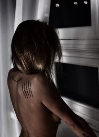 Tetoválás Lisa Kutuzova 1