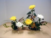 Ikebana esik a kezét