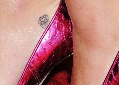 Miley Cyrus Tattoo, a média és szórakoztató portál