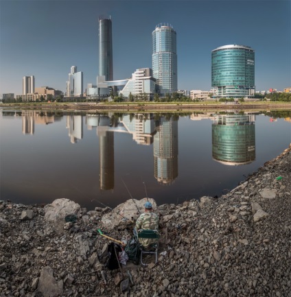 Fotografia cu un pescar pe un iaz de pește împânzit a fost într-o selecție de național geografic