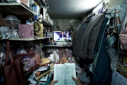 Fotograful a arătat cum chinezii săraci trăiesc în cutii de apartamente