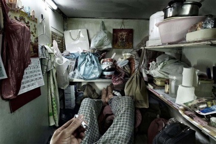 Fotograful a arătat cum chinezii săraci trăiesc în cutii de apartamente