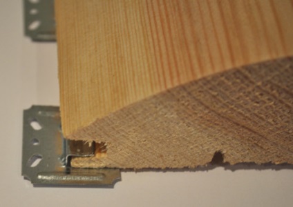Tehnologia de instalare a unității de locuințe - fixarea pe perete, căptușeala blocului de lemn de casă