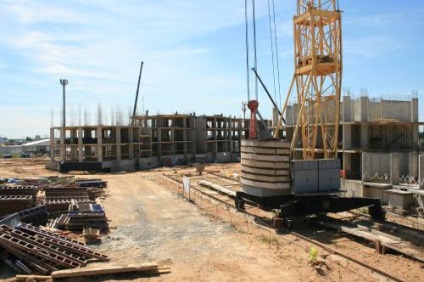 În ce stadiu de construcție este mai profitabil și mai sigur să achiziționați locuințe de la o companie de dezvoltatori?