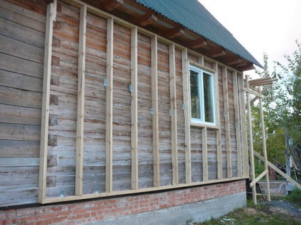 Izolarea termică a pereților casei de lemn din exterior cu vată ecologică
