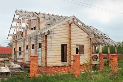 Izolarea termică a casei din lemn pe exterior cu vată minerală