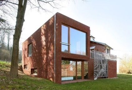 Proiectarea unei case din cărămidă în afara fațadelor foto cu pod