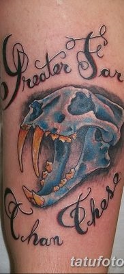 Înțeles tattoo saber-toothed tiger meaning, story, photo, sketches