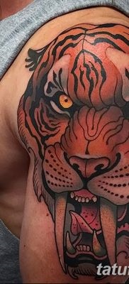 Înțeles tattoo saber-toothed tiger meaning, history, photo, sketches