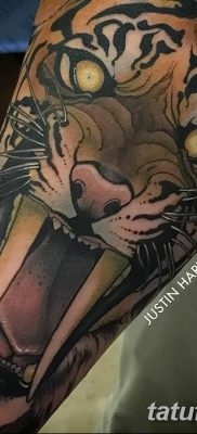 Înțeles tattoo saber-toothed tiger meaning, history, photo, sketches