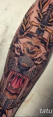 Înțeles tattoo saber-toothed tiger meaning, story, photo, sketches