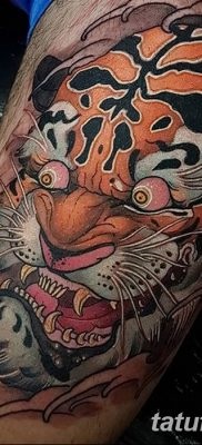 Înțeles tattoo saber-toothed tiger meaning, story, photo, sketches