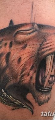 Înțeles tattoo saber-toothed tiger meaning, history, photo, sketches