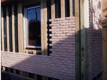 Decât să acoperiți o casă de lemn din exterior - căptușeala unei case din lemn cu cărămidă