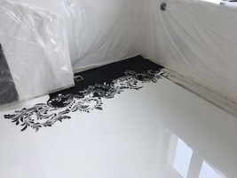 O podea inlay cu un model pentru camere de diferite tipuri