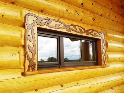 Executarea deschiderilor unei case din lemn în stilul unei colibe rusești