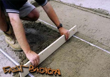 Tehnologia de așezare a plăcilor de pavaj pe o bază de beton