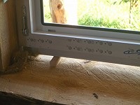 Műanyag ablakok egy faházban